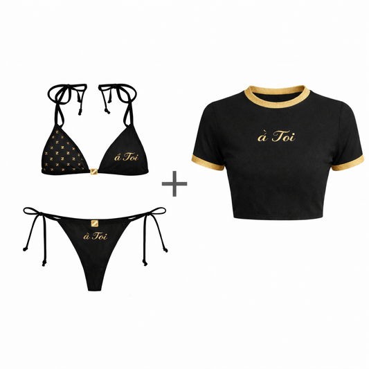 Black bikini set with 'a Toi' branding and a matching black crop top on a white background.